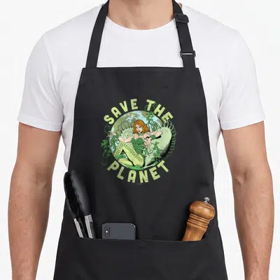 Poison earth apron - Poison Ivy seated in vine circle before globe with Save The Planet text — shown on a black cotton canvas apron against a white background