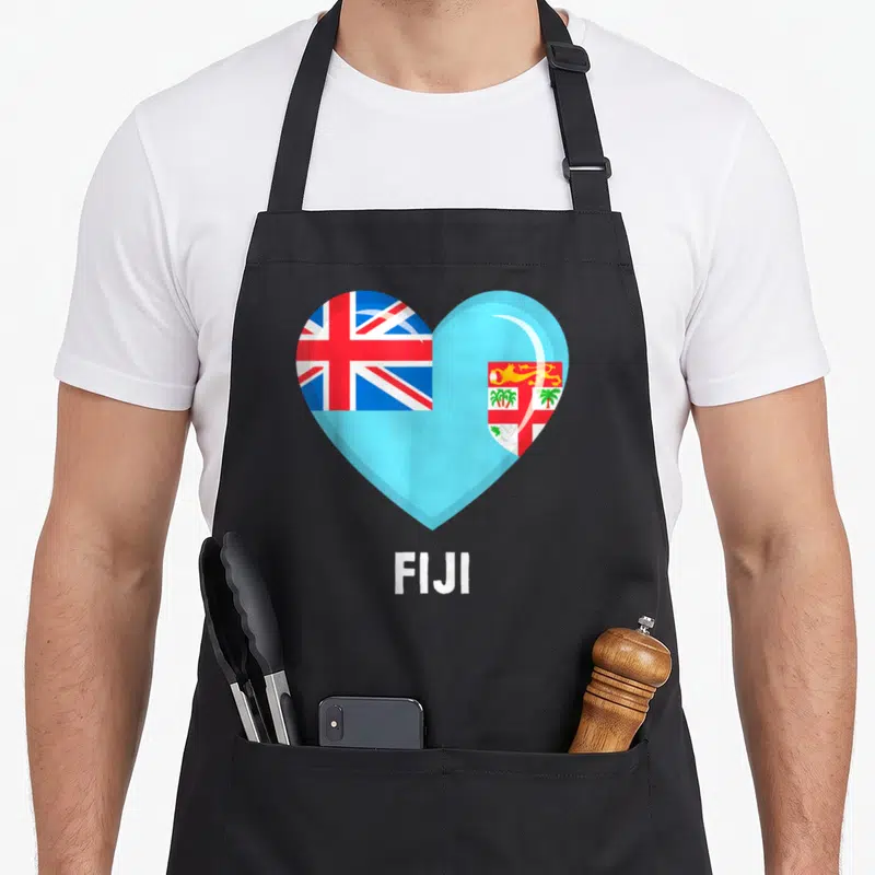 Jersey fiji apron - Heart shape filled with Fiji flag colors above white FIJI text — shown on a black cotton canvas apron against a white background