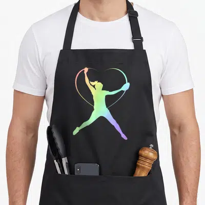 Rainbow patterned apron - Gradient gymnast silhouette with ribbon forming a heart shape in red yellow green blue purple — shown on a black cotton canvas apron against a white background