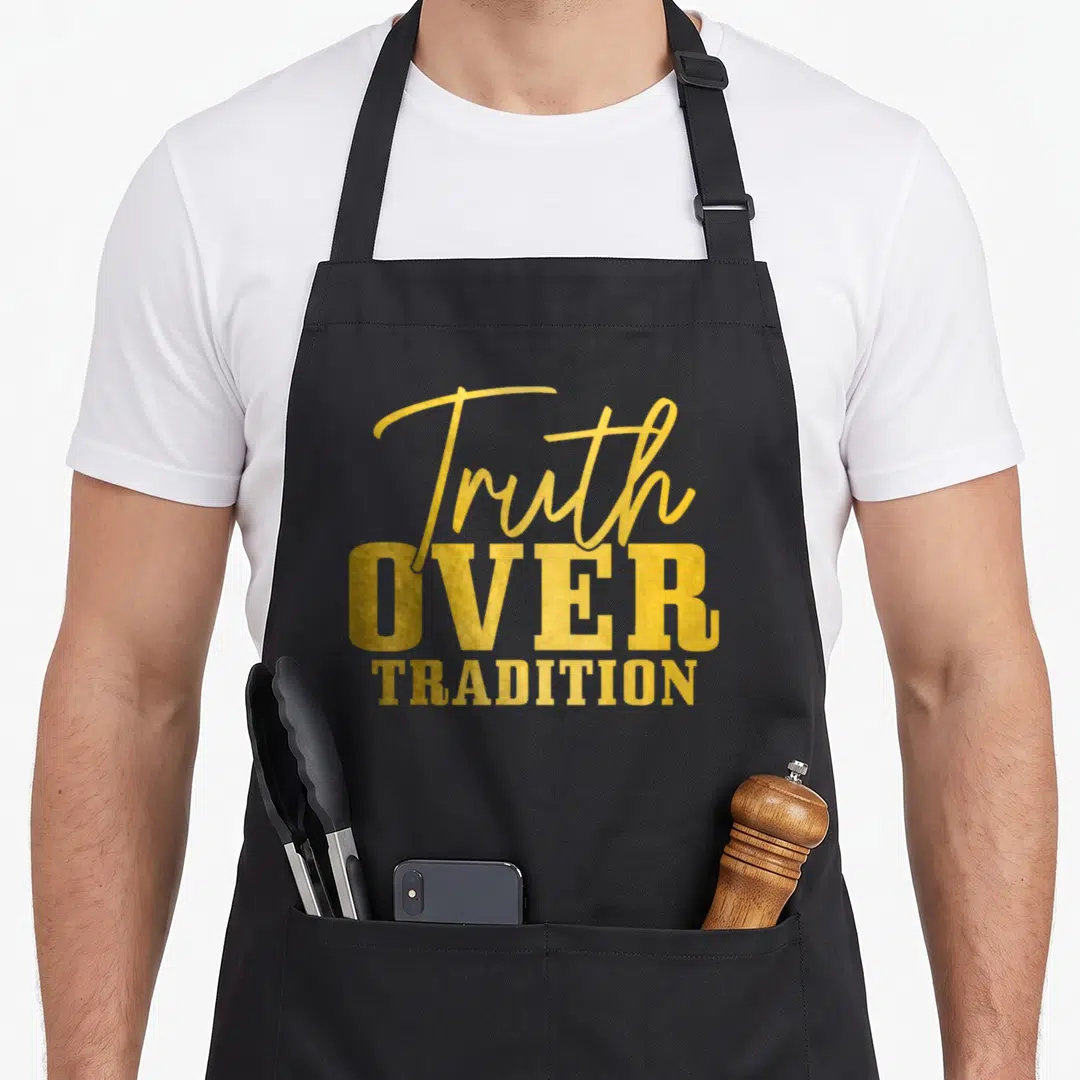 Tradition hebrew aprons - Gold stacked text reading Truth Over Tradition in script and block fonts — shown on a black cotton canvas apron against a white background