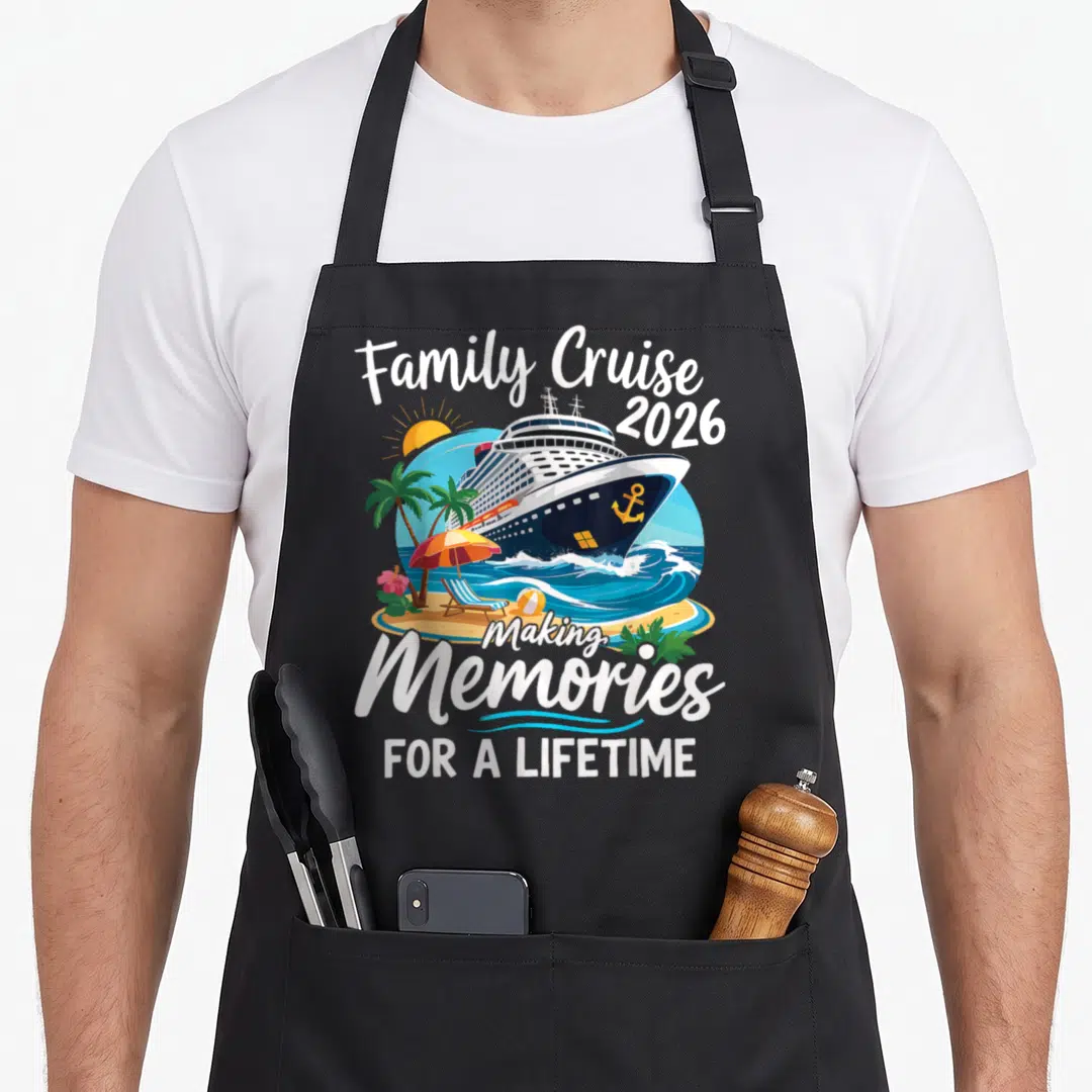 Vacation summer family aprons - Cruise ship and beach scene with Family Cruise 2026 text — shown on a black cotton canvas apron against a white background