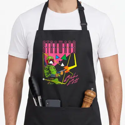 Blast 90s apron - Retro Boba Fett holding blaster with geometric shapes and STAR WARS text in pink and green — shown on a black cotton canvas apron against a white background