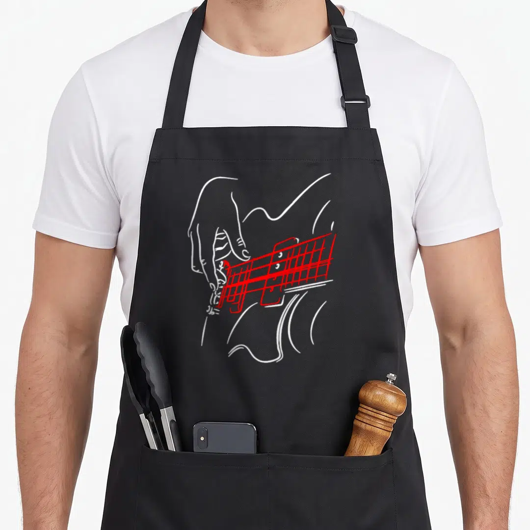 Acoustic motif sea apron - White line-art hand pressing red guitar strings and fretboard — shown on a black cotton canvas apron against a white background