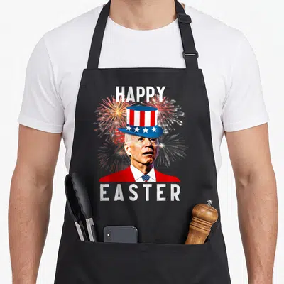 Joe easter apron - Photo of Joe Biden in red suit and patriotic top hat with fireworks, HAPPY EASTER text — shown on a black cotton canvas apron against a white background
