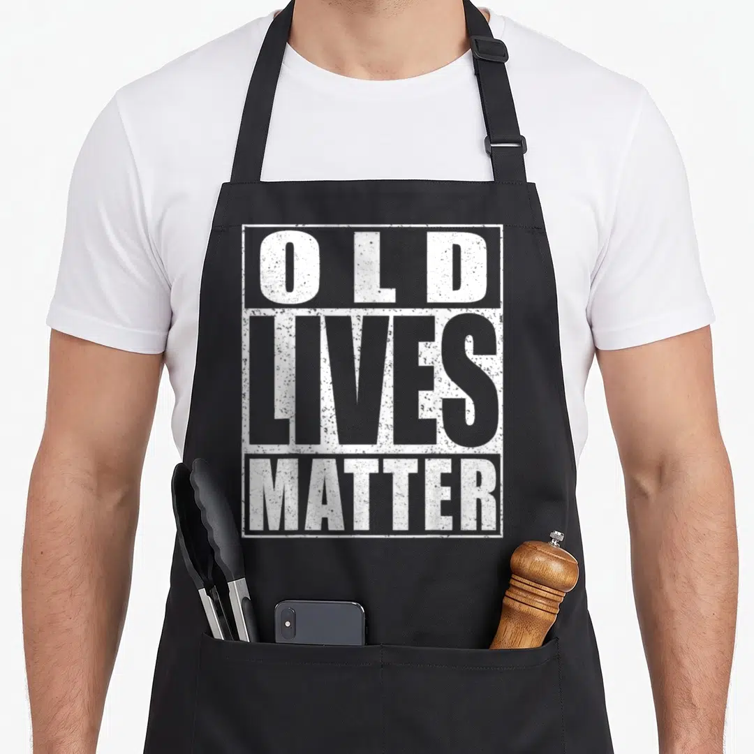 Elderly old lives matter apron - Stacked white distressed text OLD LIVES MATTER inside three rectangular borders — shown on a black cotton canvas apron against a white background