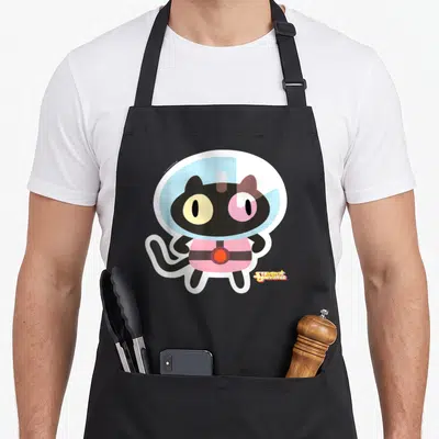 Universe cat apron - Cartoon black cat wearing pink spacesuit and light blue helmet with white border — shown on a black cotton canvas apron against a white background
