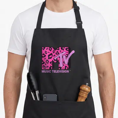 Funny mtv leopard print apron - Pink and black 3D M with leopard print fill overlapped by script TV and MUSIC — shown on a black cotton canvas apron against a white background