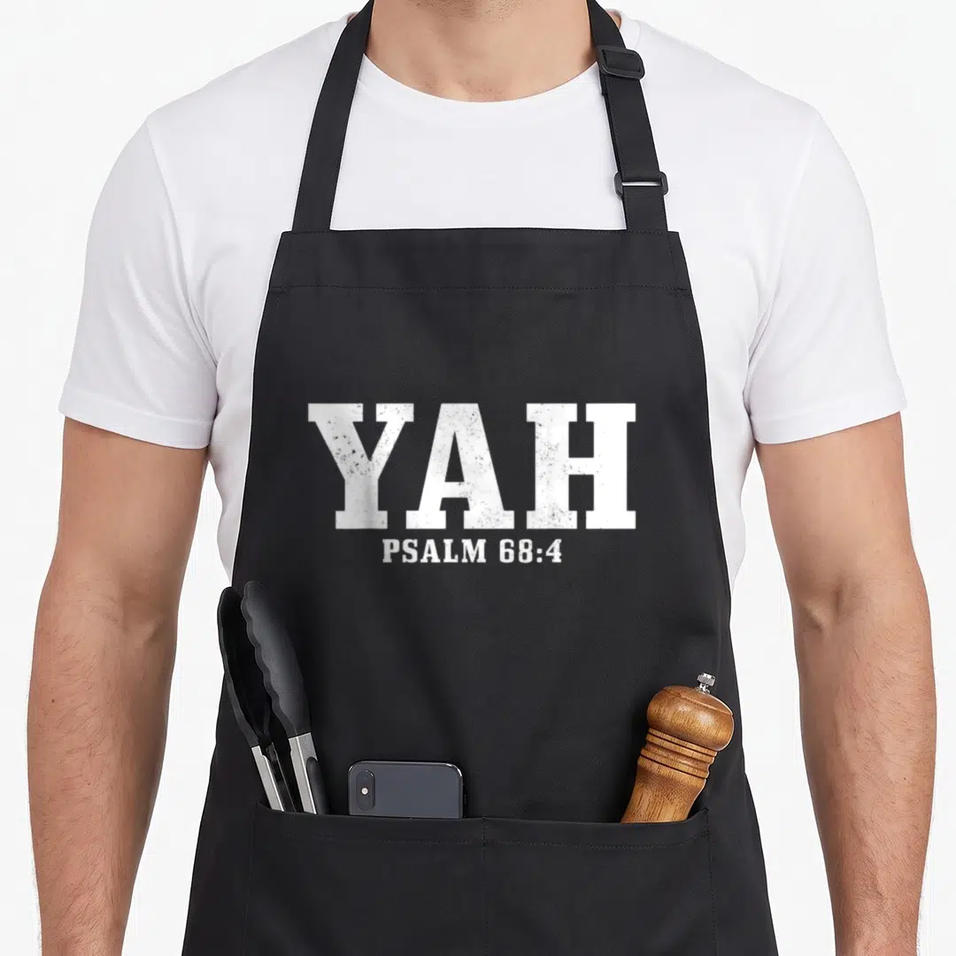 Yah jewish apron - White YAH PSALM 68:4 stacked typography on grey background — shown on a black cotton canvas apron against a white background