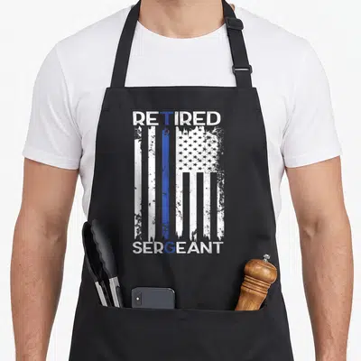 Blue line retirement apron - Retired Sergeant distressed flag with thin blue line white and blue text — shown on a black cotton canvas apron against a white background