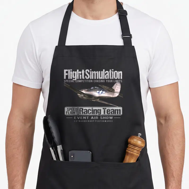 Simulation airplane apron - Distressed silver airplane with Flight Simulation Racing Team text and blue star insignia — shown on a black cotton canvas apron against a white background