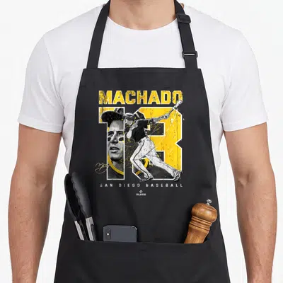 Number mvp apron - Machado text and yellow 13 with baseball player portrait and San Diego Baseball label — shown on a black cotton canvas apron against a white background