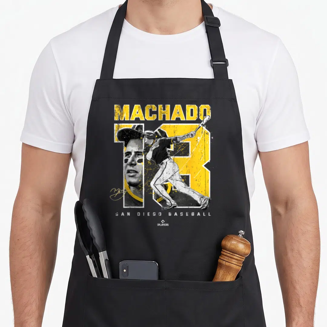 Number mvp apron - Machado text and yellow 13 with baseball player portrait and San Diego Baseball label — shown on a black cotton canvas apron against a white background