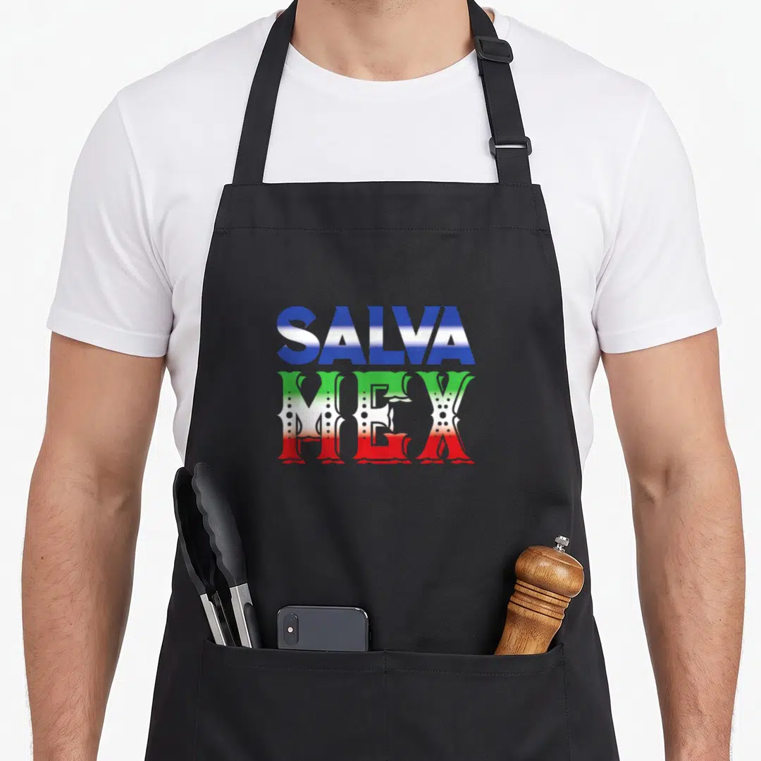 Colorful el cook apron - SALVA in blue and white stripes above MEX in green white and red with dot accents — shown on a black cotton canvas apron against a white background