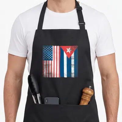 Cuba pride american flag apron - Two distressed flags merged side-by-side in red white and blue — shown on a black cotton canvas apron against a white background