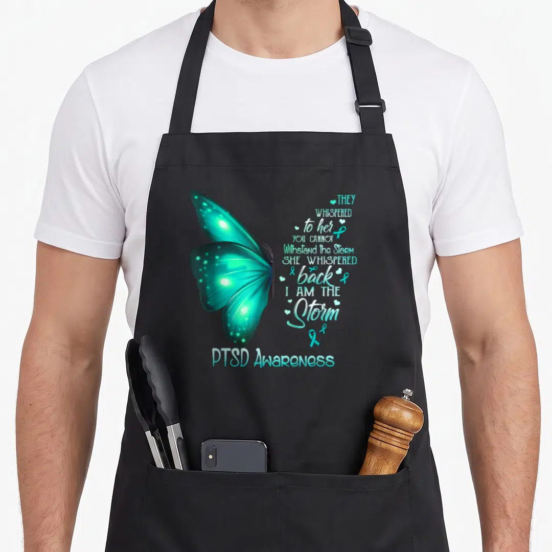 Ptsd butterfly apron - Teal watercolor butterfly with PTSD awareness poem and ribbon icons — shown on a black cotton canvas apron against a white background