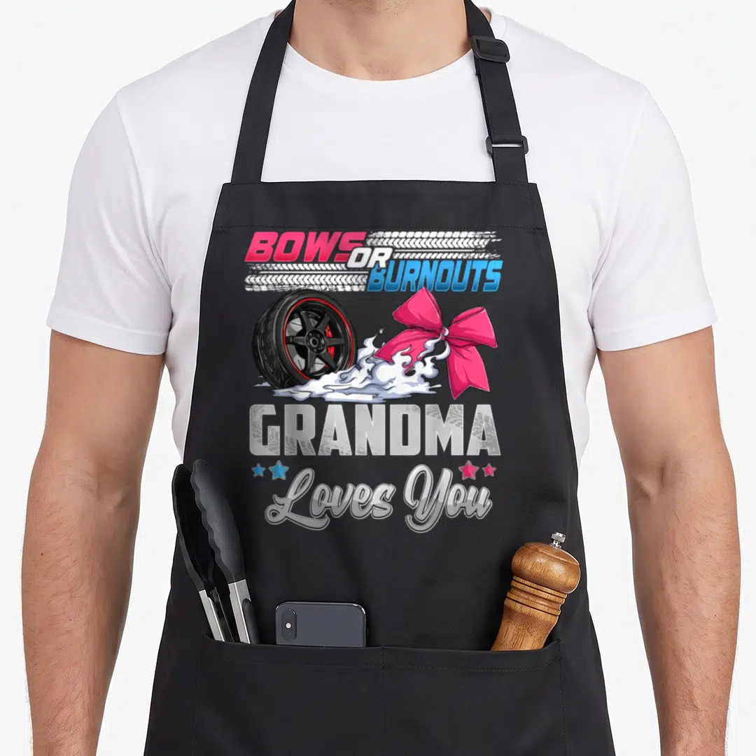 Grandma bow apron - Bows or Burnouts text with car wheel, pink bow, smoke, and Grandma Loves You lettering — shown on a black cotton canvas apron against a white background