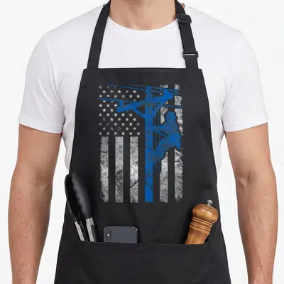 Thin patriotic aprons - Blue lineman silhouette on distressed white and blue American flag pattern — shown on a black cotton canvas apron against a white background
