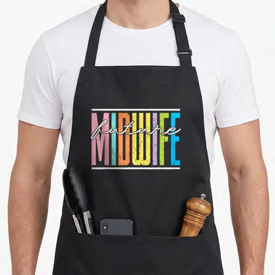 Future midwife apron - Multi-colored block text MIDWIFE with white script future overlaid between two horizontal lines — shown on a black cotton canvas apron against a white background