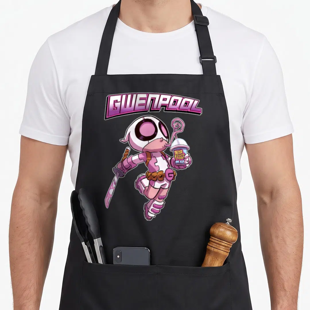 Gwenpool cartoon apron - GWENPOOL DEAD FRIES text above pink character holding sword and DEAD FREAK drink cup — shown on a black cotton canvas apron against a white background