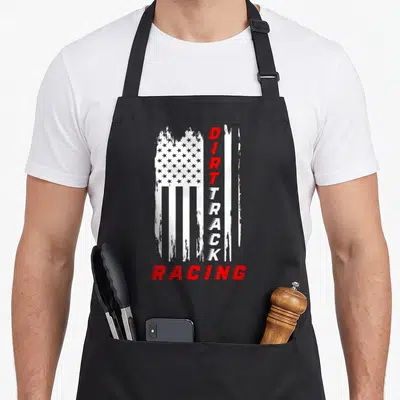 Dirt racing track apron - Distressed vertical USA flag with stacked DIRT TRACK RACING text in white and red — shown on a black cotton canvas apron against a white background