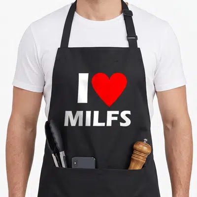 Milf i love passion apron - White letter I next to red heart above white MILFS text — shown on a black cotton canvas apron against a white background