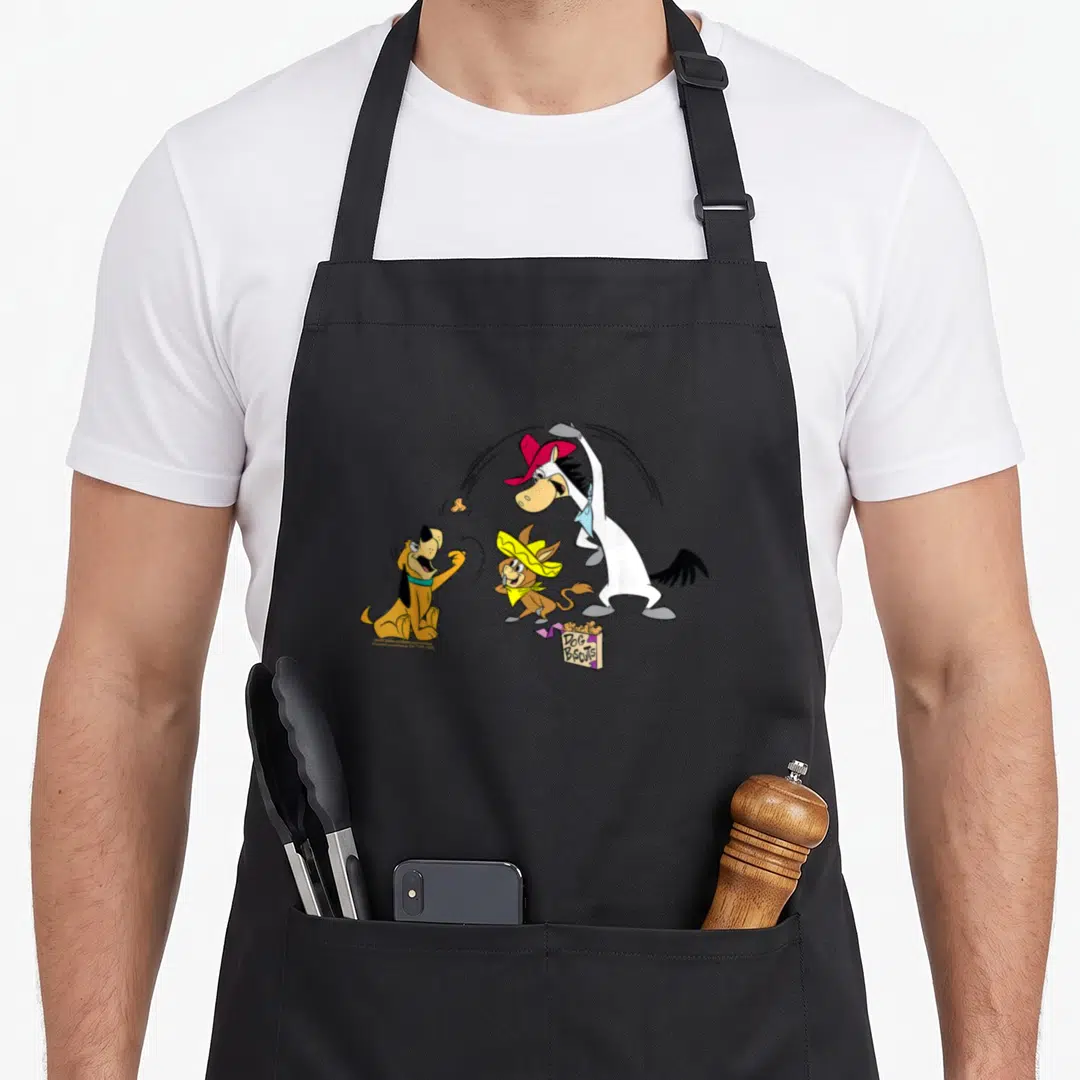 Draw quick apron - Cartoon white horse, two dogs, flying biscuits, and DOG BISCUITS box in color — shown on a black cotton canvas apron against a white background