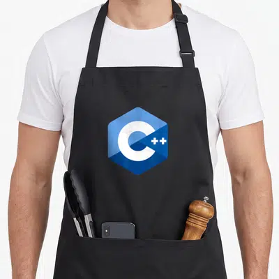 Programmer programming geek apron - Blue hexagon containing white C++ letters on an apron panel — shown on a black cotton canvas apron against a white background