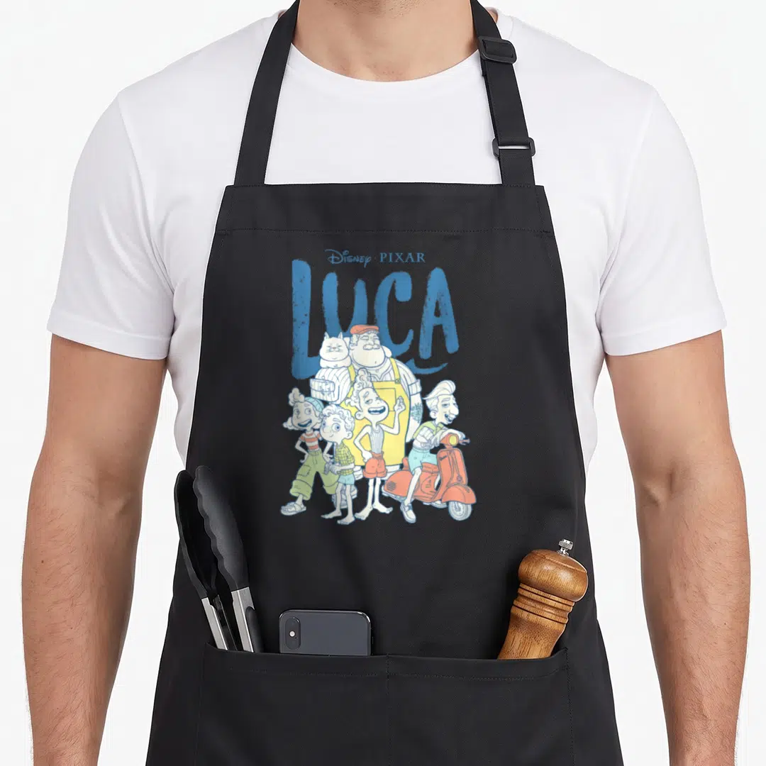 Luca shot apron - Cartoon characters and red scooter in front of blue Luca text — shown on a black cotton canvas apron against a white background