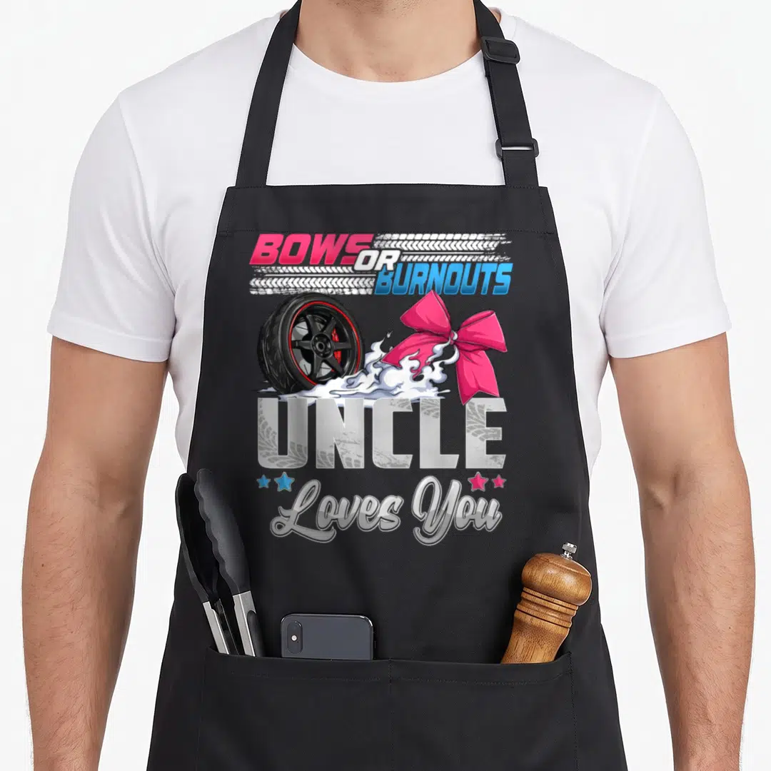 Uncle bow apron - Car wheel and pink bow with BOWS OR BURNOUTS text and Uncle Loves You lettering — shown on a black cotton canvas apron against a white background