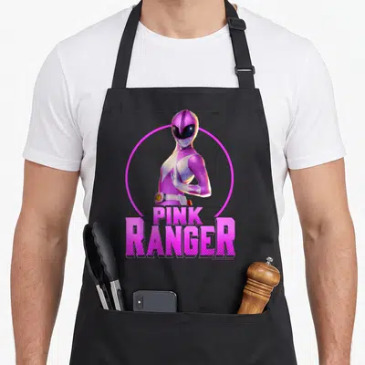 Circle karate apron - Pink Ranger photo inside pink circle with PINK RANGER text below — shown on a black cotton canvas apron against a white background