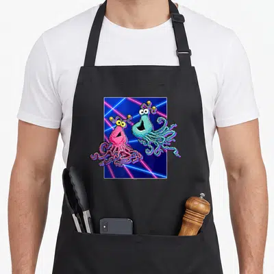 Yip street apron - Two cartoon squids in pink and blue with neon laser lines on dark background — shown on a black cotton canvas apron against a white background