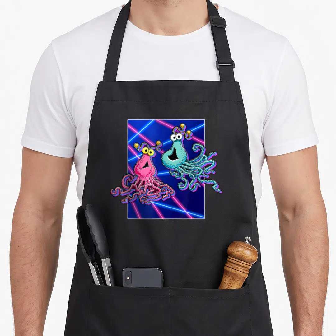 Yip street apron - Two cartoon squids in pink and blue with neon laser lines on dark background — shown on a black cotton canvas apron against a white background