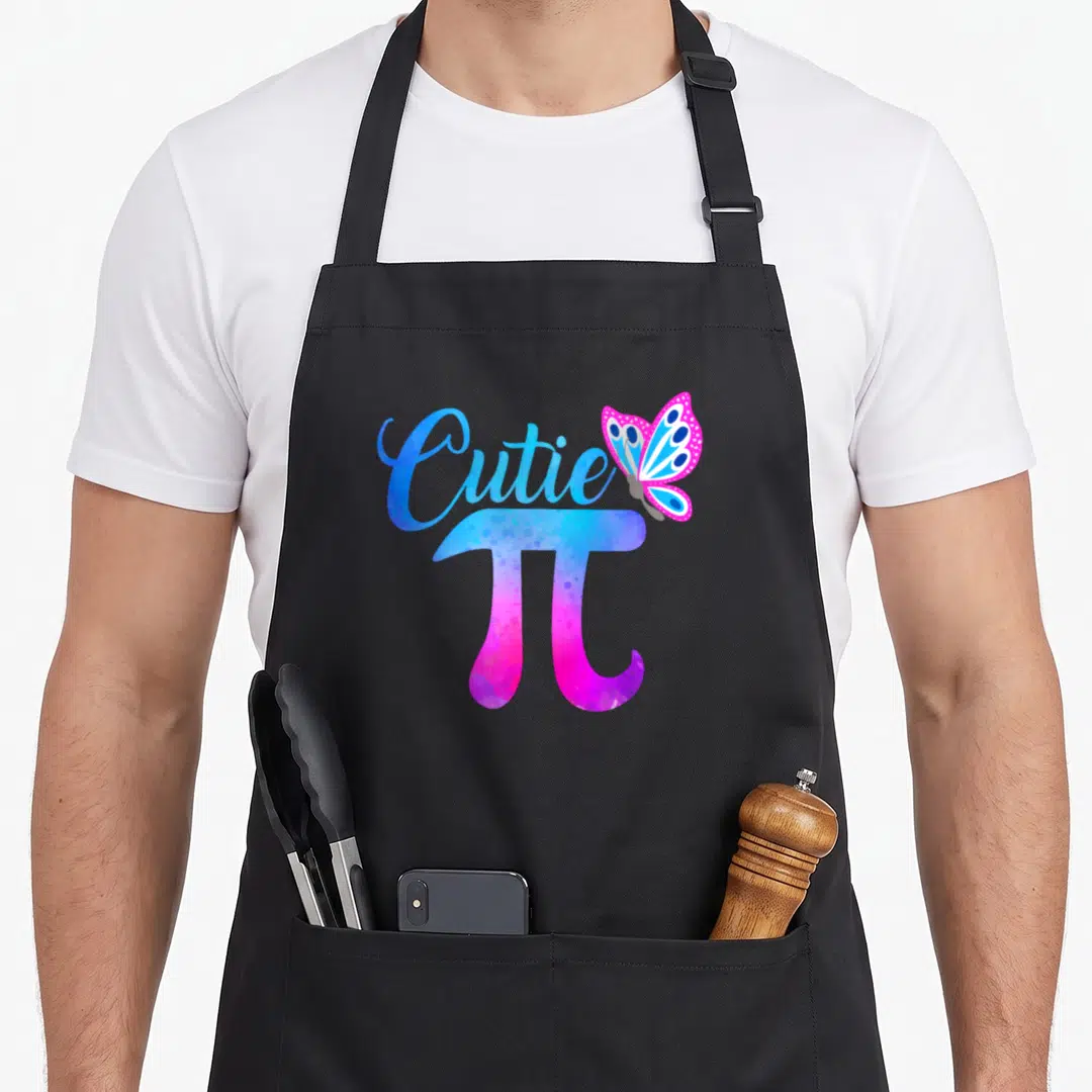 Cutie butterfly apron - Cutie text and pi symbol in blue pink purple with butterfly — shown on a black cotton canvas apron against a white background