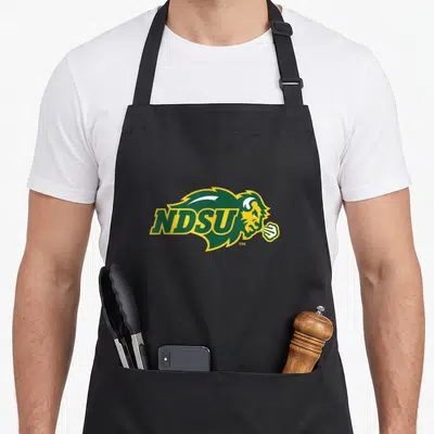 North bison apron - NDSU logo over bison profile with steam in green yellow white — shown on a black cotton canvas apron against a white background