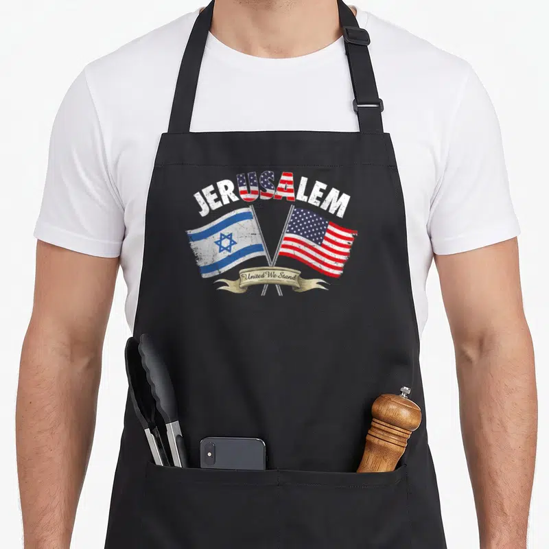 Stand jerusalem apron - JERUSALEM text with crossed Israeli and USA flags and United We Stand ribbon in distressed red — shown on a black cotton canvas apron against a white background