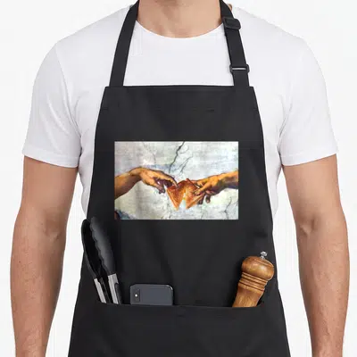 Creation cheese apron - Two hands reaching for a split grilled cheese sandwich in fresco style — shown on a black cotton canvas apron against a white background