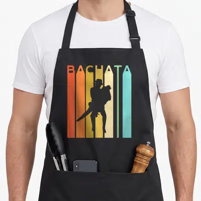 Latina bachata apron - Grey dancing couple silhouette over vertical red orange yellow beige green and blue stripes — shown on a black cotton canvas apron against a white background