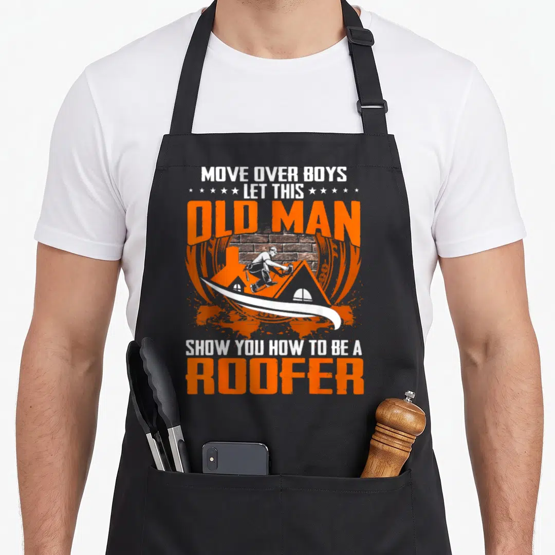 Move roofer apron - Roofer on orange roof with brick wall, surrounded by bold orange and white text reading Move — shown on a black cotton canvas apron against a white background