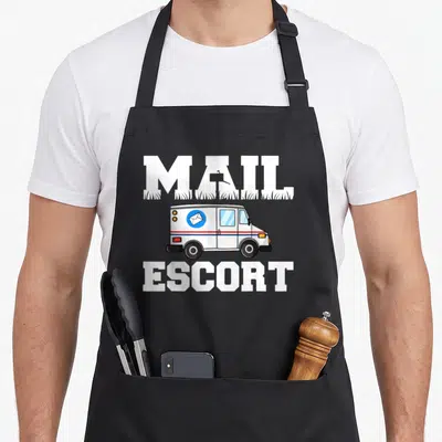 Postal service apron - Cartoon mail truck with red and blue stripes below white MAIL text and above ESCORT text — shown on a black cotton canvas apron against a white background