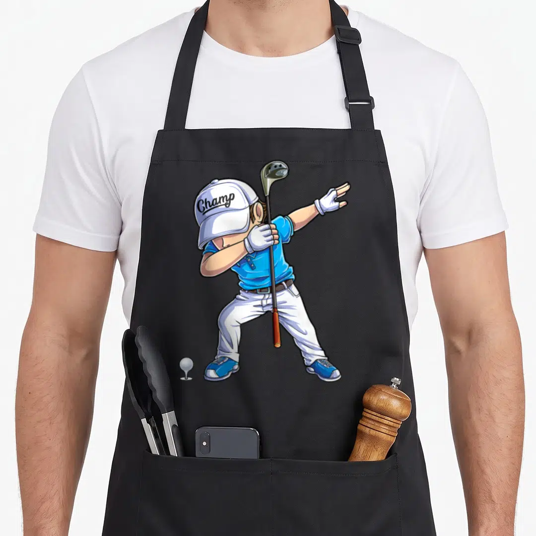 Dab golf apron - Cartoon golfer in blue shirt and white pants dabbing with a club and Champ hat — shown on a black cotton canvas apron against a white background