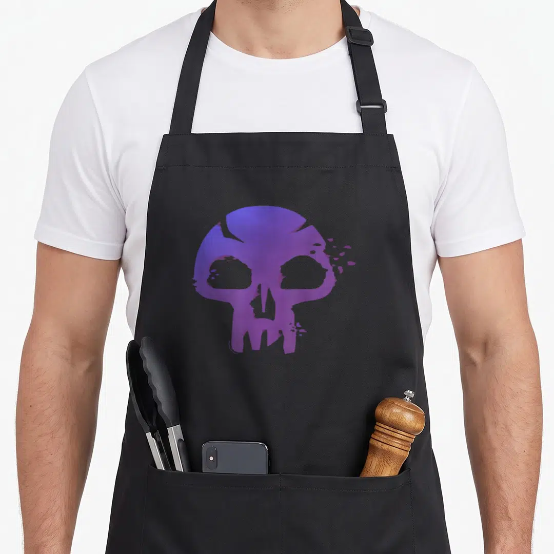 Symbol magic apron - Purple and blue gradient cartoon skull centered on black fabric — shown on a black cotton canvas apron against a white background