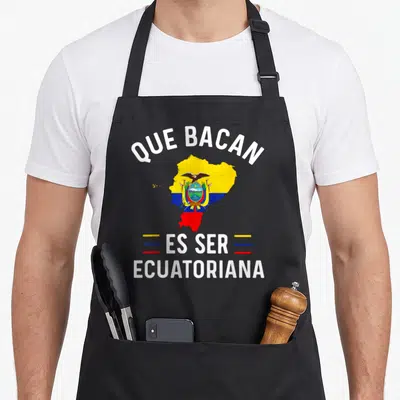 Camiseta ecuadorian apron - Map of Ecuador filled with yellow blue and red flag colors under arched white text — shown on a black cotton canvas apron against a white background