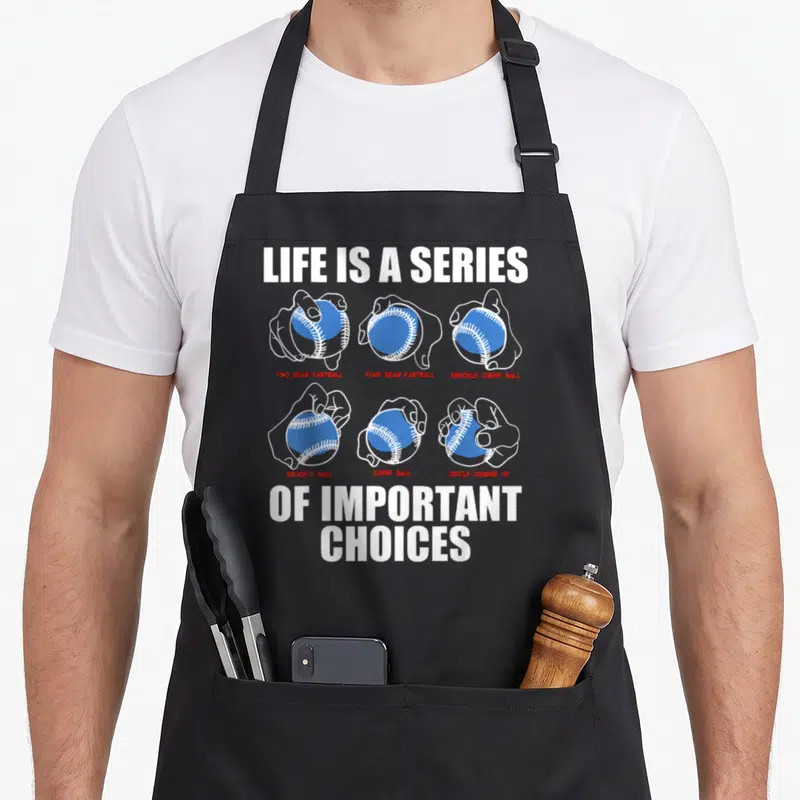 Pitch baseball apron - Six hands holding blue baseballs with red labels and white text LIFE IS A SERIES OF IMPORTANT — shown on a black cotton canvas apron against a white background