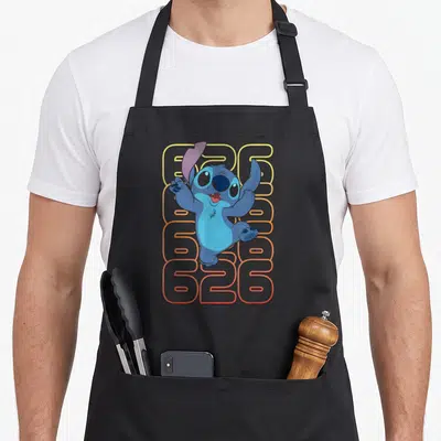 Experiment stitch apron - Blue Stitch character over four stacked 626 rows yellow to red gradient — shown on a black cotton canvas apron against a white background