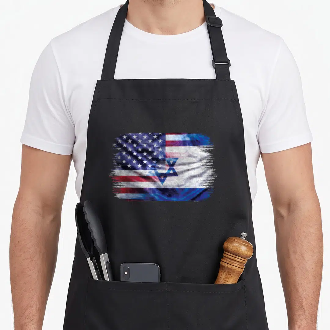 Israeli pride american flag apron - Merged US and Israel flags in red white blue distressed brush stroke rectangle — shown on a black cotton canvas apron against a white background