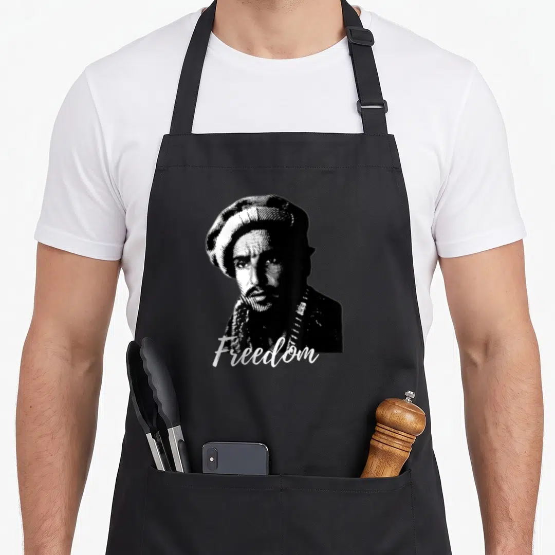 Free afghan apron - Black and white portrait of a man in a hat with the word Freedom scripted below — shown on a black cotton canvas apron against a white background