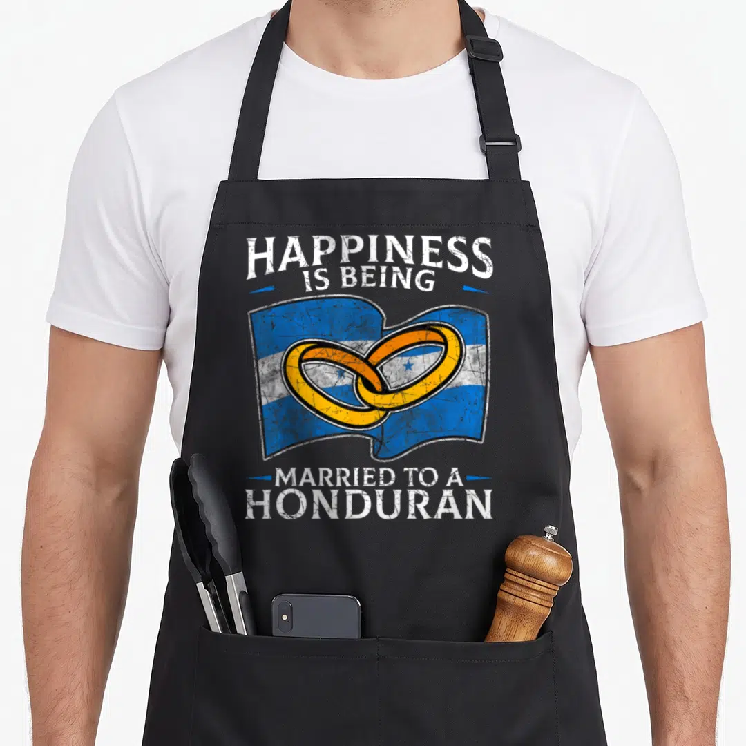 Honduran heritage aprons - Two gold rings on blue and white flag with distressed text — shown on a black cotton canvas apron against a white background