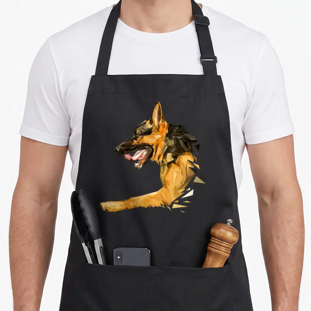 Funny shepherd dog mom apron - Low poly geometric German Shepherd head in tan brown and black polygons — shown on a black cotton canvas apron against a white background