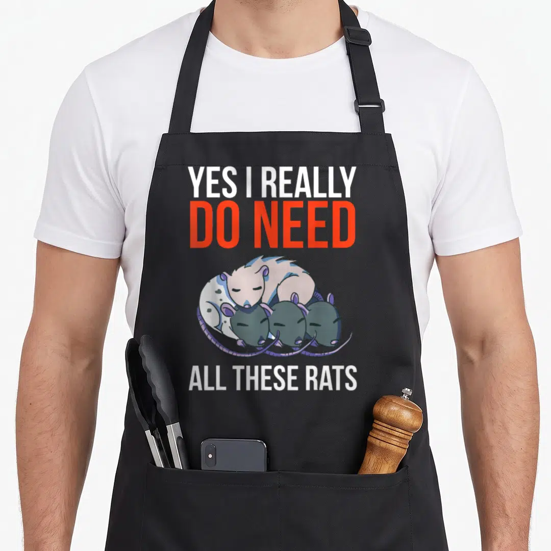 These rat do i need an apron - Three sleeping cartoon rats under stacked text YES I REALLY DO NEED ALL THESE RATS — shown on a black cotton canvas apron against a white background