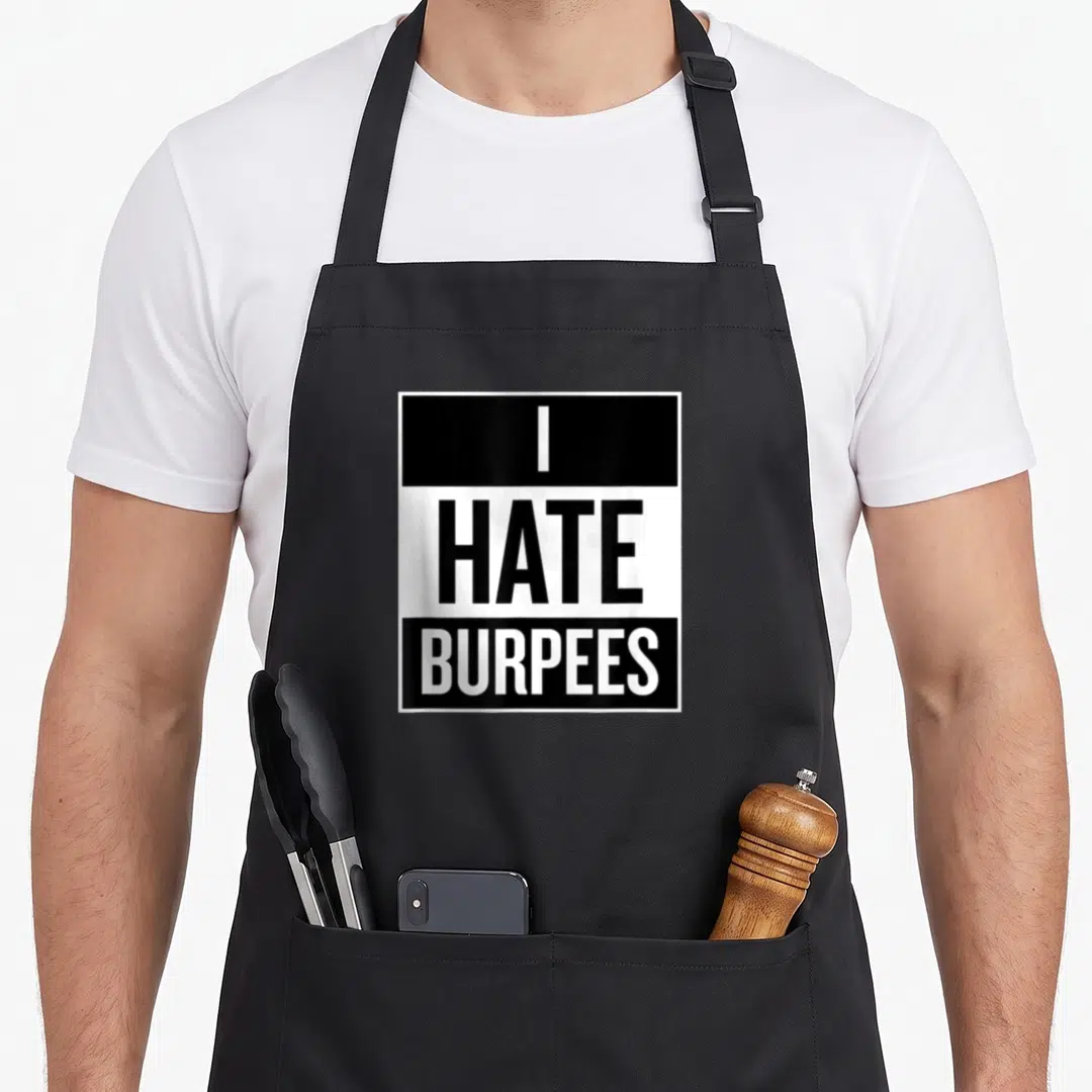 Hate fitness burpees apron - Black and white stacked text reading I HATE BURPEES in three horizontal bands — shown on a black cotton canvas apron against a white background